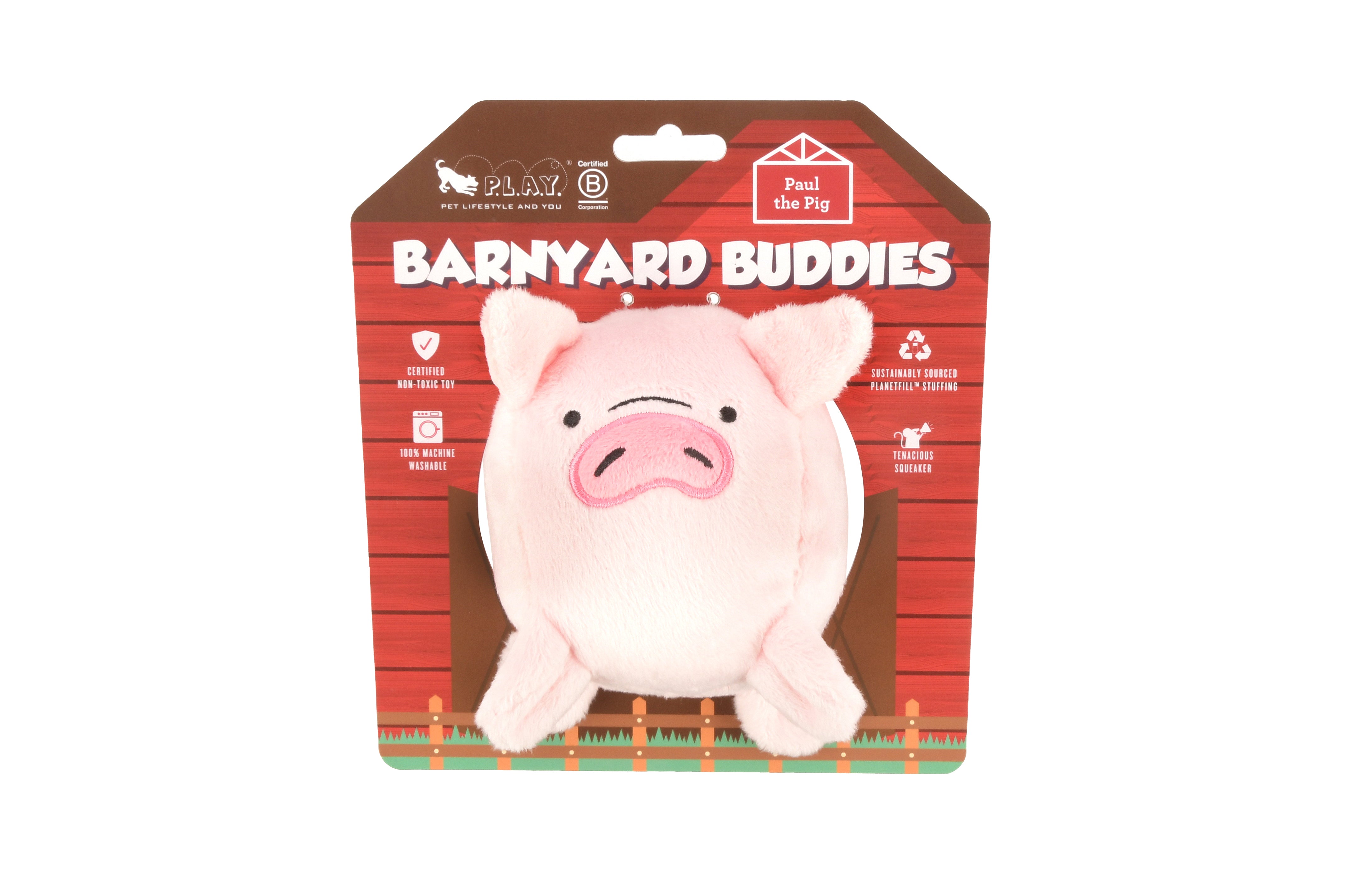 Barnyard Buddies plush pig dog toy in barnyard themed packaging.