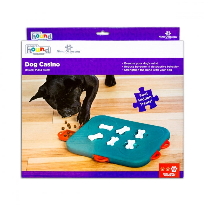 The Dog Casino puzzle helps reduce destructive behavior and fights boredom by keeping your dog busy exercising their mind. Puzzle has 6 treat drawers that encourage your dog to paw, nose, and nudge to access the treats. Lock the bones on the top of the puzzle to increase the difficulty level.
