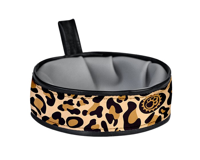 Trail Buddy Collapsible Travel Bowl is waterproof, stylish, functional, durable, and handmade in the USA with recyclable material. The wide and sturdy construction prevents spills, while the compact collapsible design easily stows away when not in use. Includes a carry loop for easy attachment to leashes or bags. Holds 20 ounces of water.