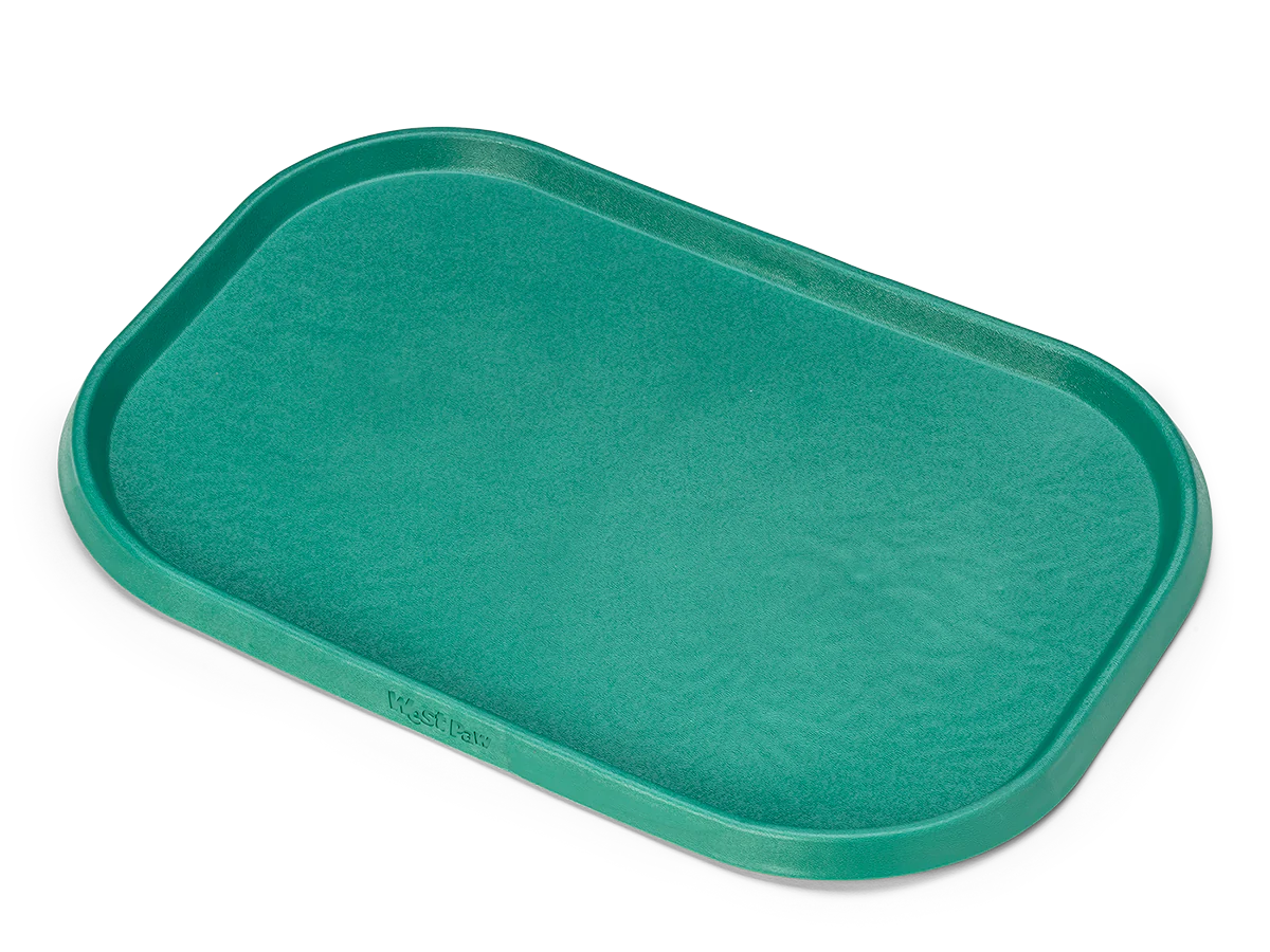 Encourage your dog's natural eating habits with the all new feeding mat from West Paw! Mat can be used as a combination forage plate for meals and a non-slip mat for water bowls. Thoughtfully designed with raised edges to keep food messes & water spills contained.