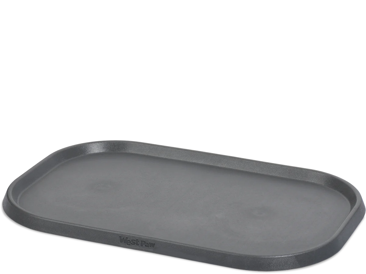 Encourage your dog's natural eating habits with the all new feeding mat from West Paw! Mat can be used as a combination forage plate for meals and a non-slip mat for water bowls. Thoughtfully designed with raised edges to keep food messes & water spills contained.