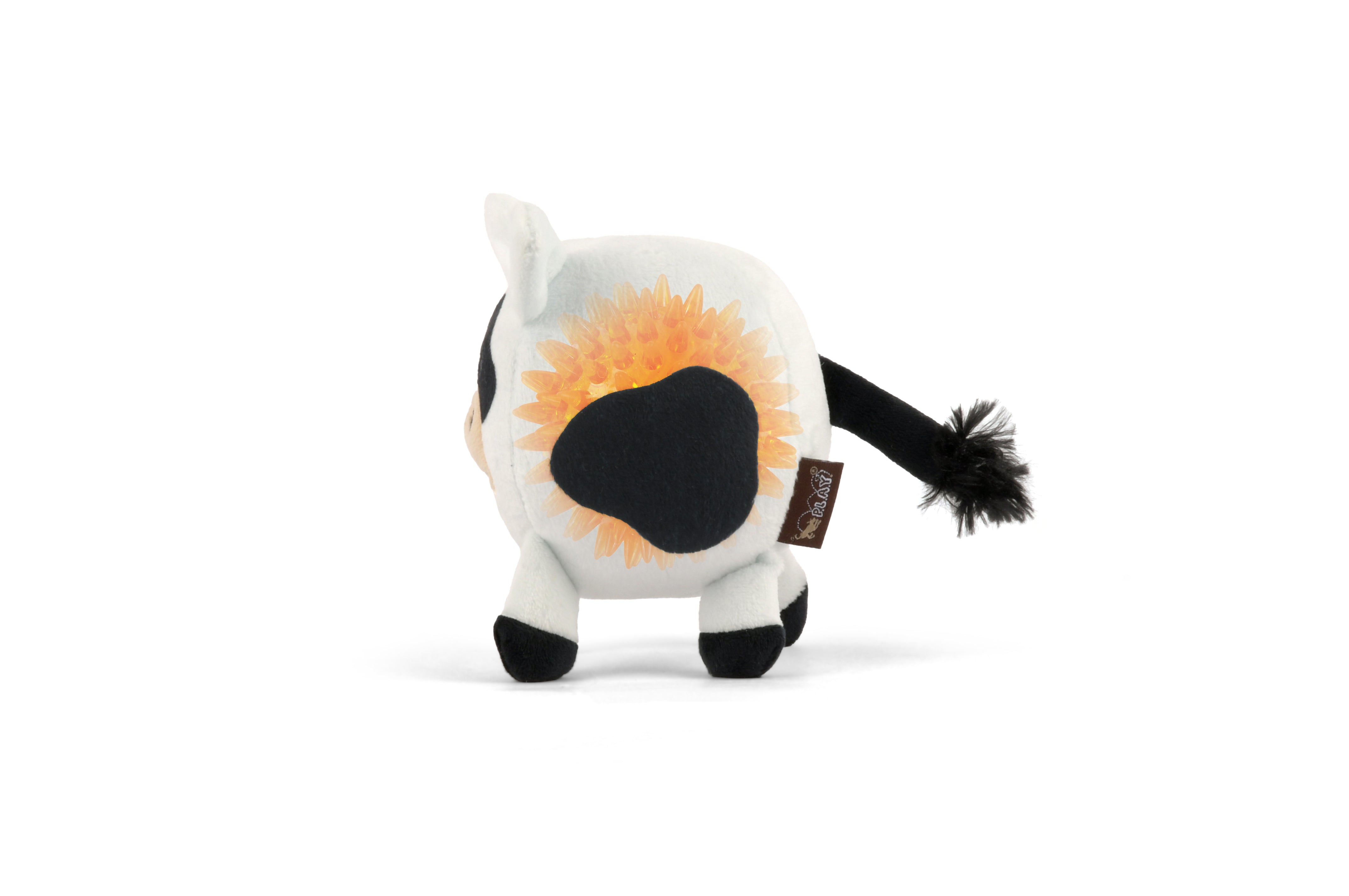 Barnyard Buddies plush cow dog toy showing spiky squeak ball hidden inside.