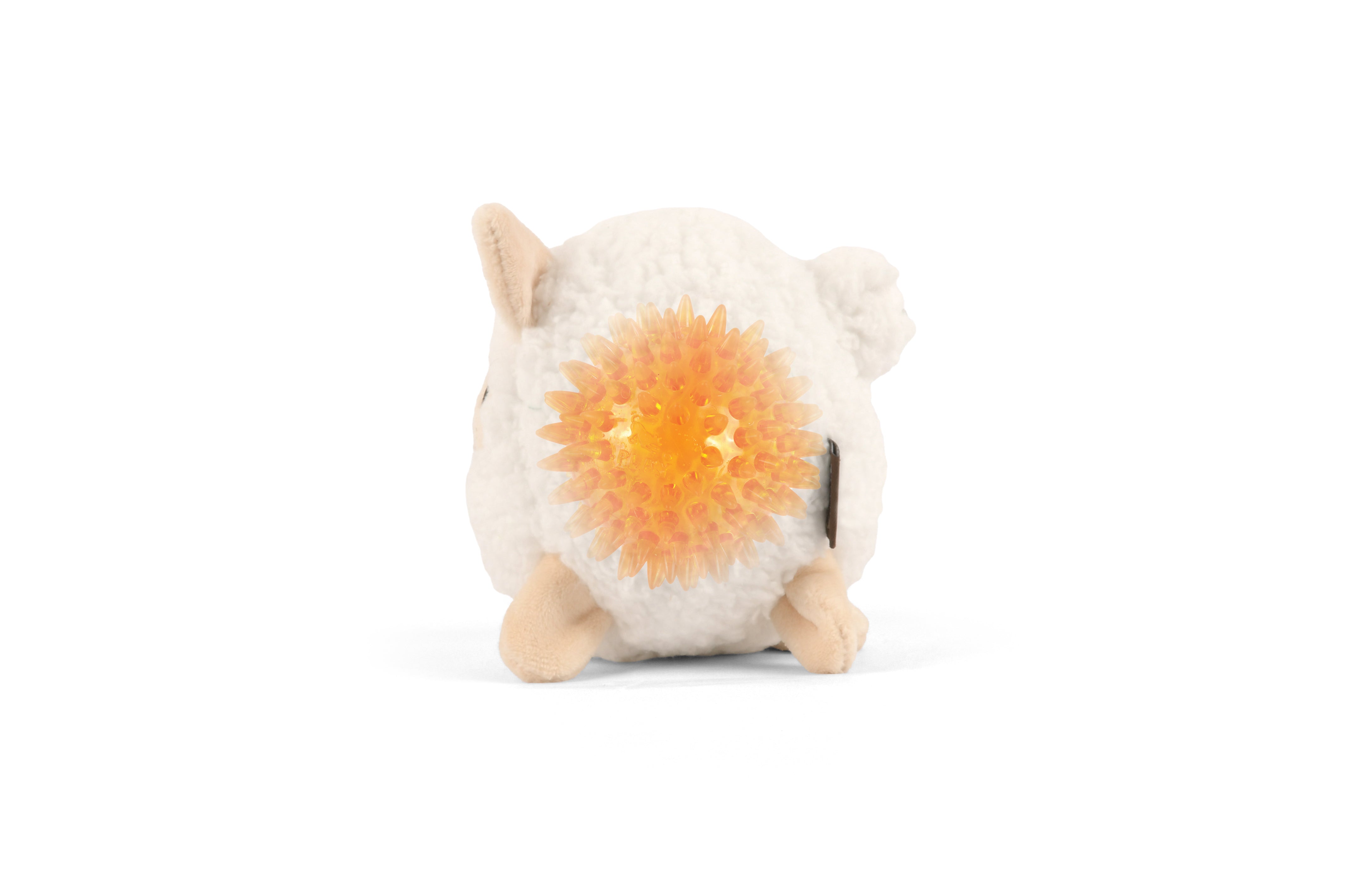 Barnyard Buddies plush sheep dog toy showing spiky squeak ball hidden inside.