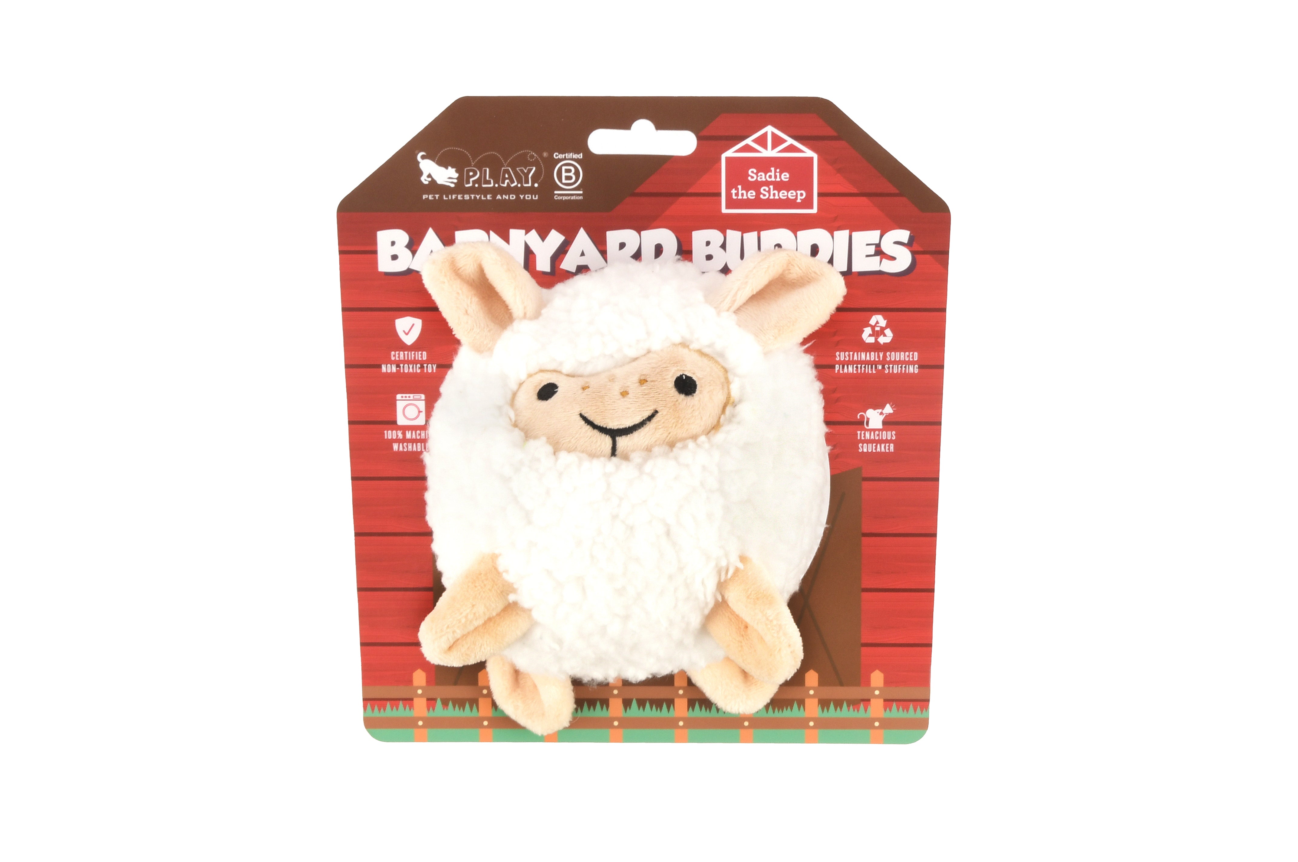 Barnyard Buddies plush sheep dog toy in barnyard themed packaging. 