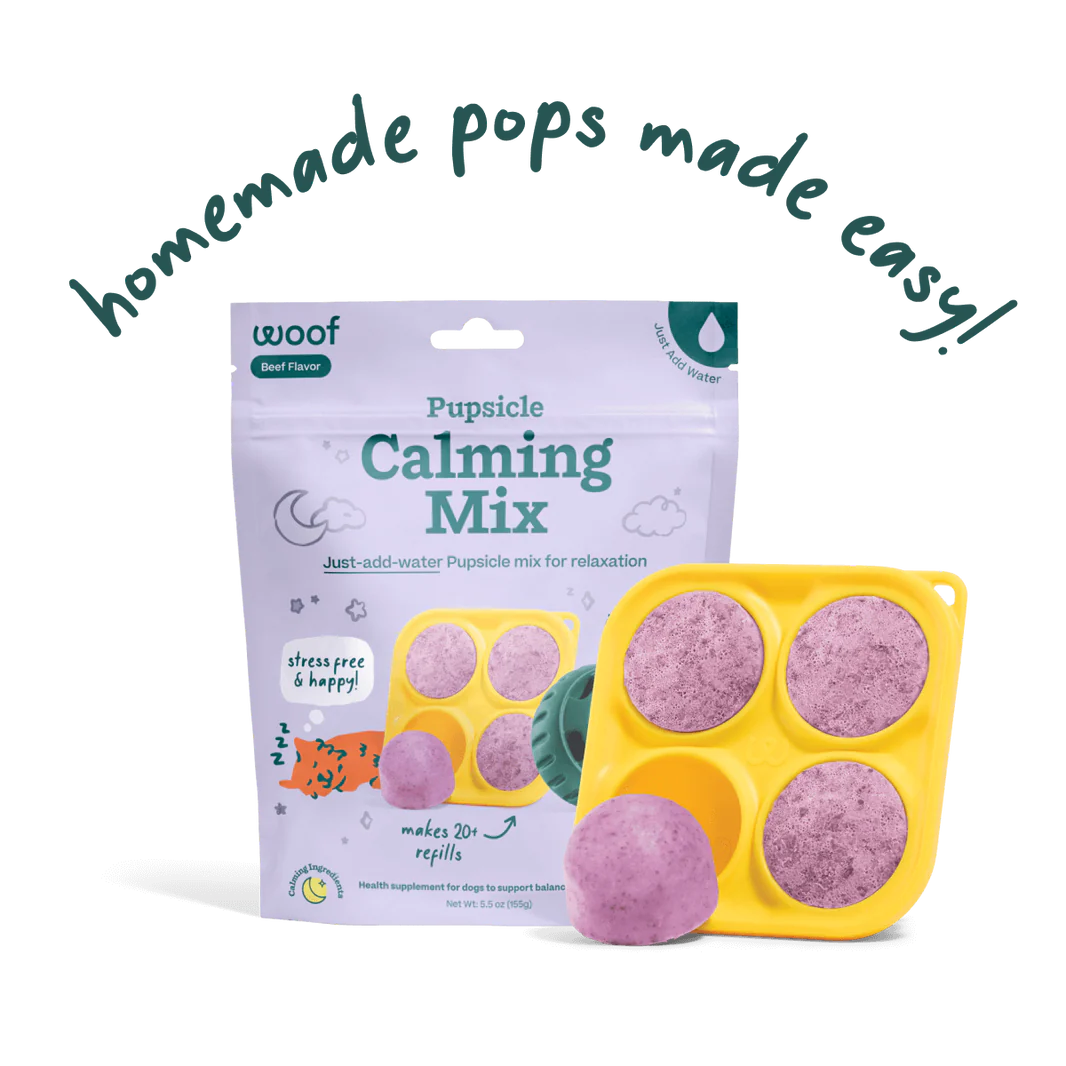Package of the calming Pupsicle treat mix next to the Pupsicle treat tray filled with frozen refill pops.