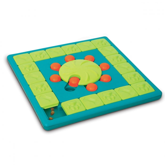 The MultiPuzzle dog puzzle is ideal for dogs who have mastered levels 1-3 of the Nina Ottosson puzzle line. Puzzle features a treat tray and 8 treat compartments with sliding blocks, covers, and locking inner wheel. Your dog will enjoy pawing, sniffing, and nudging the blocks around to reveal the hidden treats.