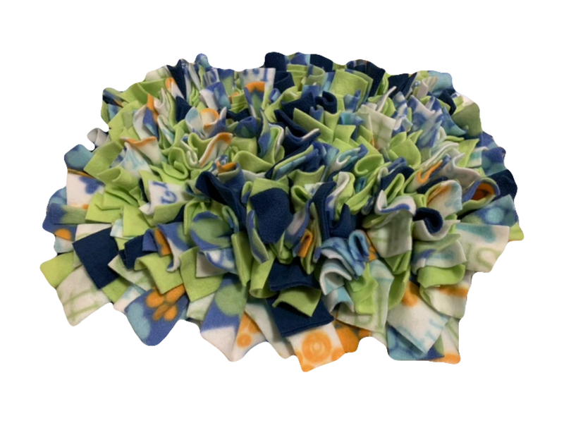 Our handmade multi-colored and multi-patterned snuffle mats are quadruple knotted to keep treats and dry food from falling through to the bottom of the mat. We use a heavy-duty rubber anti-fatigue mat for the base that is heavy, and will not slide around the floor like mats made from cheap plastic sink mats.
