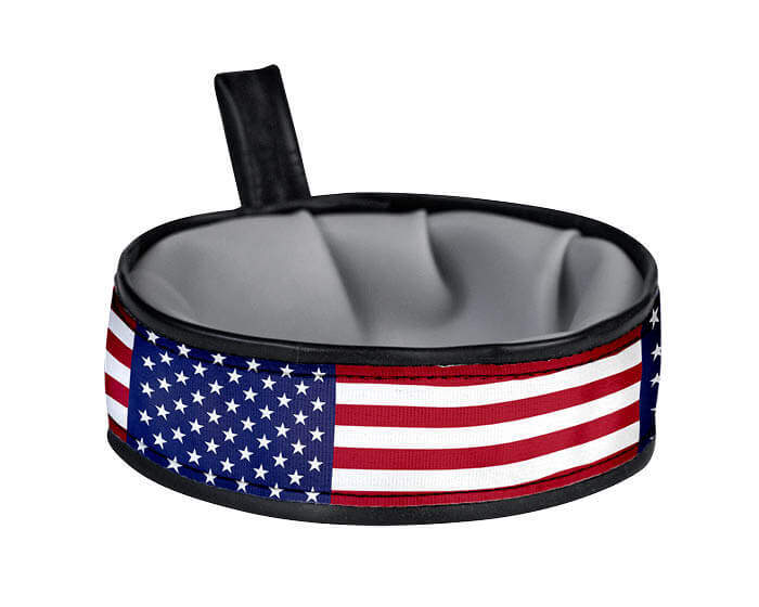 Trail Buddy Collapsible Travel Bowl is waterproof, stylish, functional, durable, and handmade in the USA with recyclable material. The wide and sturdy construction prevents spills, while the compact collapsible design easily stows away when not in use. Includes a carry loop for easy attachment to leashes or bags. Holds 20 ounces of water.