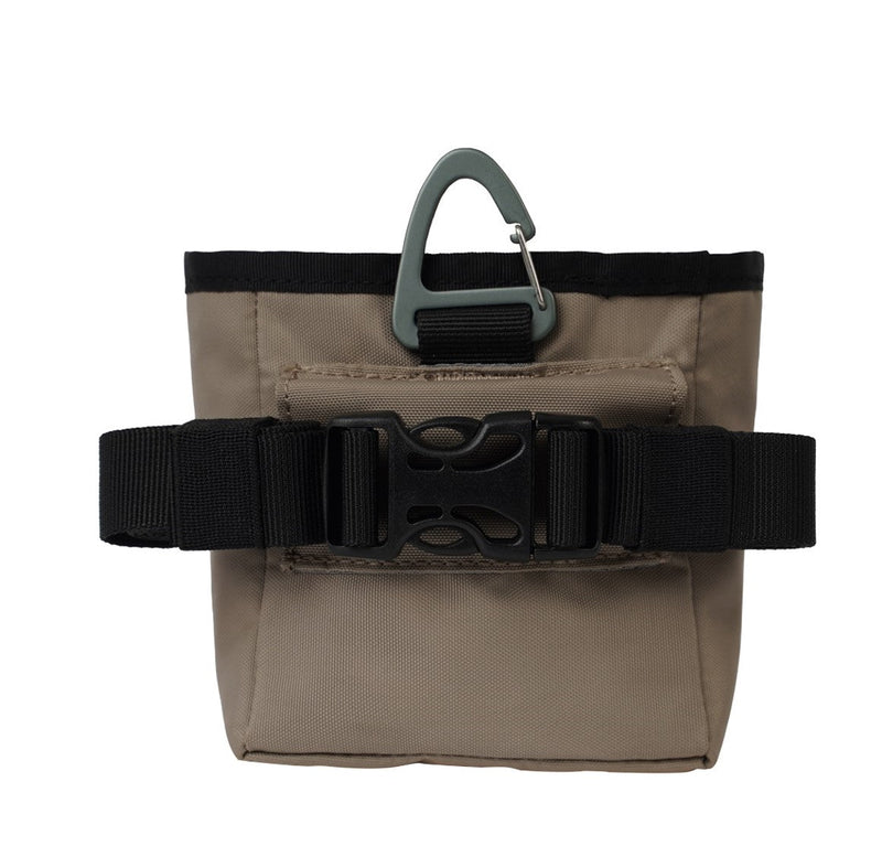 The Olly Dog Goodie Treat Bag can be worn around the waist, or clipped to a belt or pants pocket. The bag is water-resistant, and the magnetic closure allows quick and easy access to treats and to close the bag with ease. The front zipper pocket is the perfect size to hold car keys or a roll of waste bags!