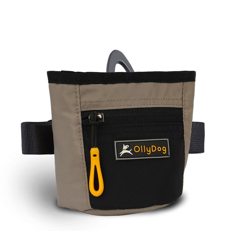 The Olly Dog Goodie Treat Bag can be worn around the waist, or clipped to a belt or pants pocket. The bag is water-resistant, and the magnetic closure allows quick and easy access to treats and to close the bag with ease. The front zipper pocket is the perfect size to hold car keys or a roll of waste bags!
