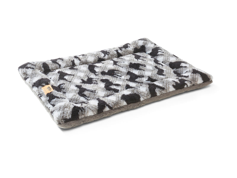 The Montana Nap Pet Bed is made of 100% eco-friendly IntelliLoft fabric and fill. It is durable, lightweight, soft, and sizes are crate-friendly. Bed can be rolled up, folded, or tossed in the car for travel ease. Perfect for use in crates, homes, offices, hotel rooms, campers, etc.