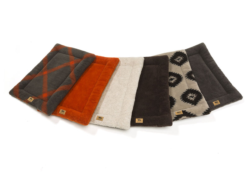 The Montana Nap Pet Bed is made of 100% eco-friendly IntelliLoft fabric and fill. It is durable, lightweight, soft, and sizes are crate-friendly. Bed can be rolled up, folded, or tossed in the car for travel ease. Perfect for use in crates, homes, offices, hotel rooms, campers, etc.