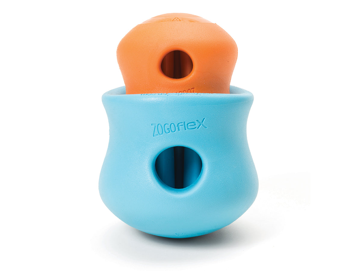 Toppl is an award-winning puzzle toy that can be stuffed full of your dog's favorite snacks. This interactive treat toy is topsy, turvy, and wobbly fun that keeps an active dog busy and brings out the playful side of an older dog.