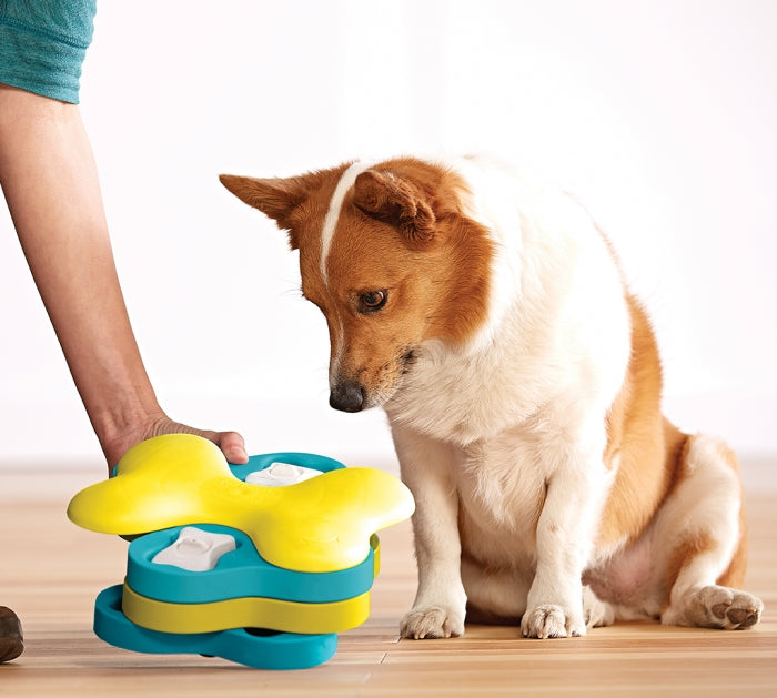 The Dog Tornado puzzle helps reduce destructive behavior and fights boredom by keeping your dog busy exercising their mind. Puzzle has 3 tiers and twelve hidden food compartments that encourage your dog to spin the tiers to reveal compartments.