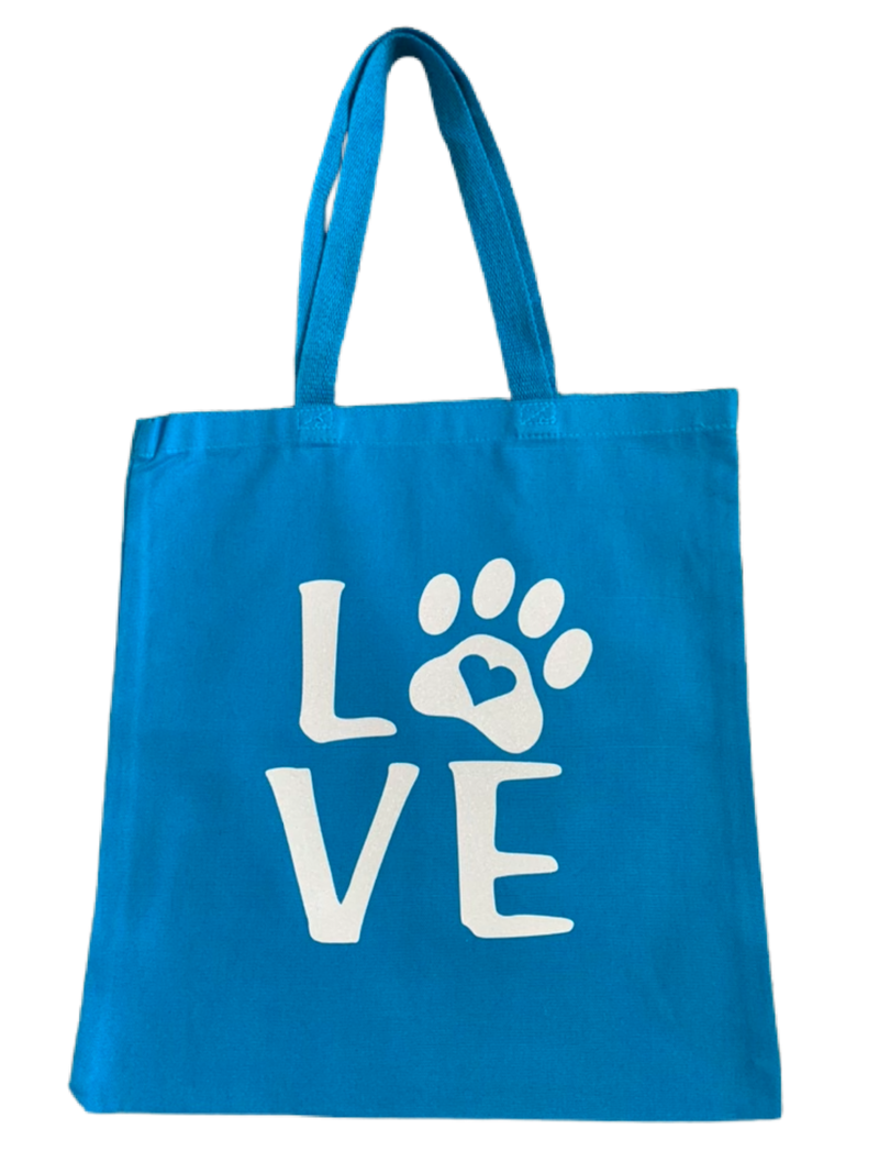 High-quality, brightly colored canvas tote bags with cute dog designs made with sparkly vinyl.