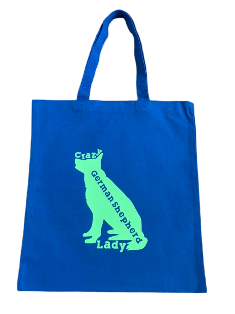 High-quality, brightly colored canvas tote bags with cute dog designs made with sparkly vinyl.