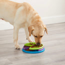 The Lickin' Layer puzzle game has three layers of food compartments that dogs need to navigate through by spinning each one to reveal the treats. Puzzle has over 100 treat compartments to keep your dog busy and engaged, and is large enough to use as a slow feeder.