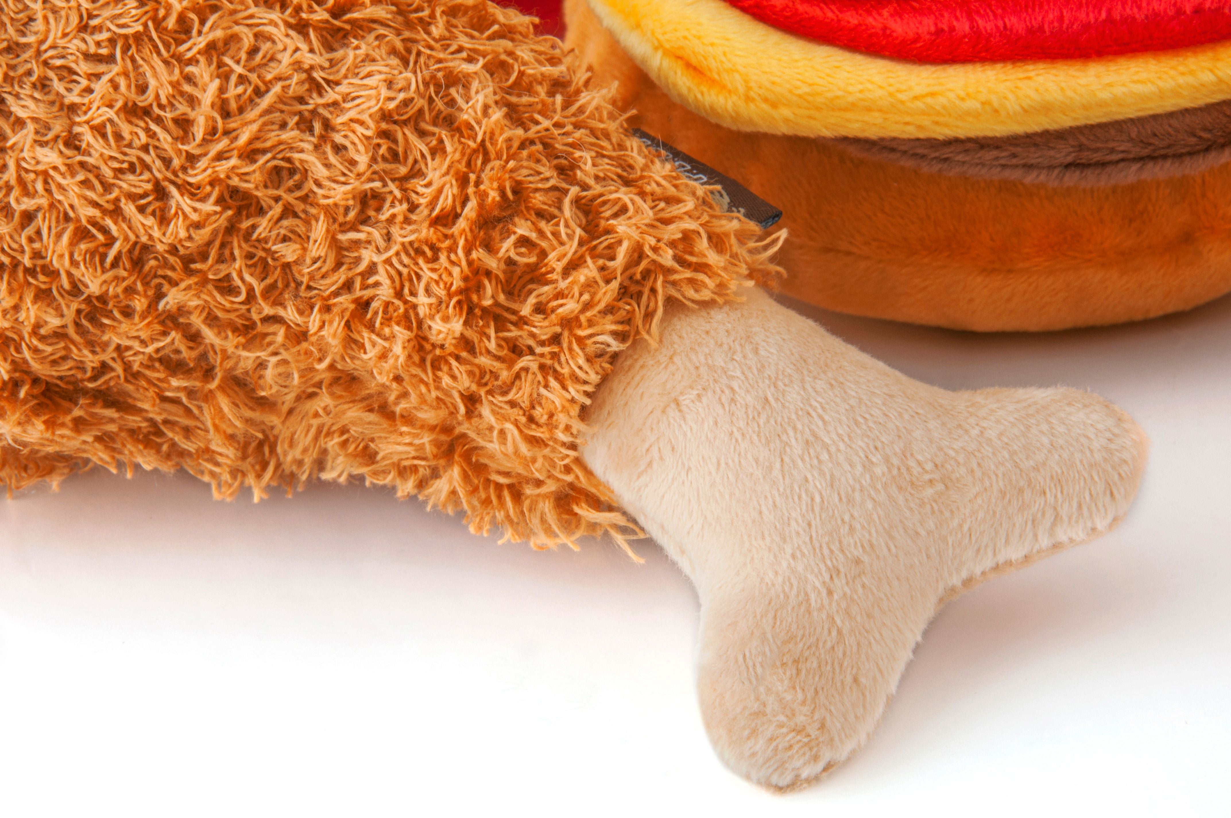 P.L.A.Y. plush dog toys are certified non-toxic, made with durable double-layered fabrics that feature reinforced stitching for extra durability, and are filled with PlanetFill® filler made from 100% post-consumer certified-safe recycled plastic bottles.